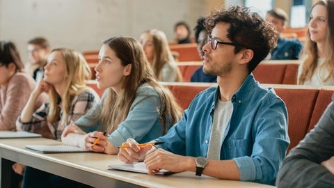 Attentive students in large classroom