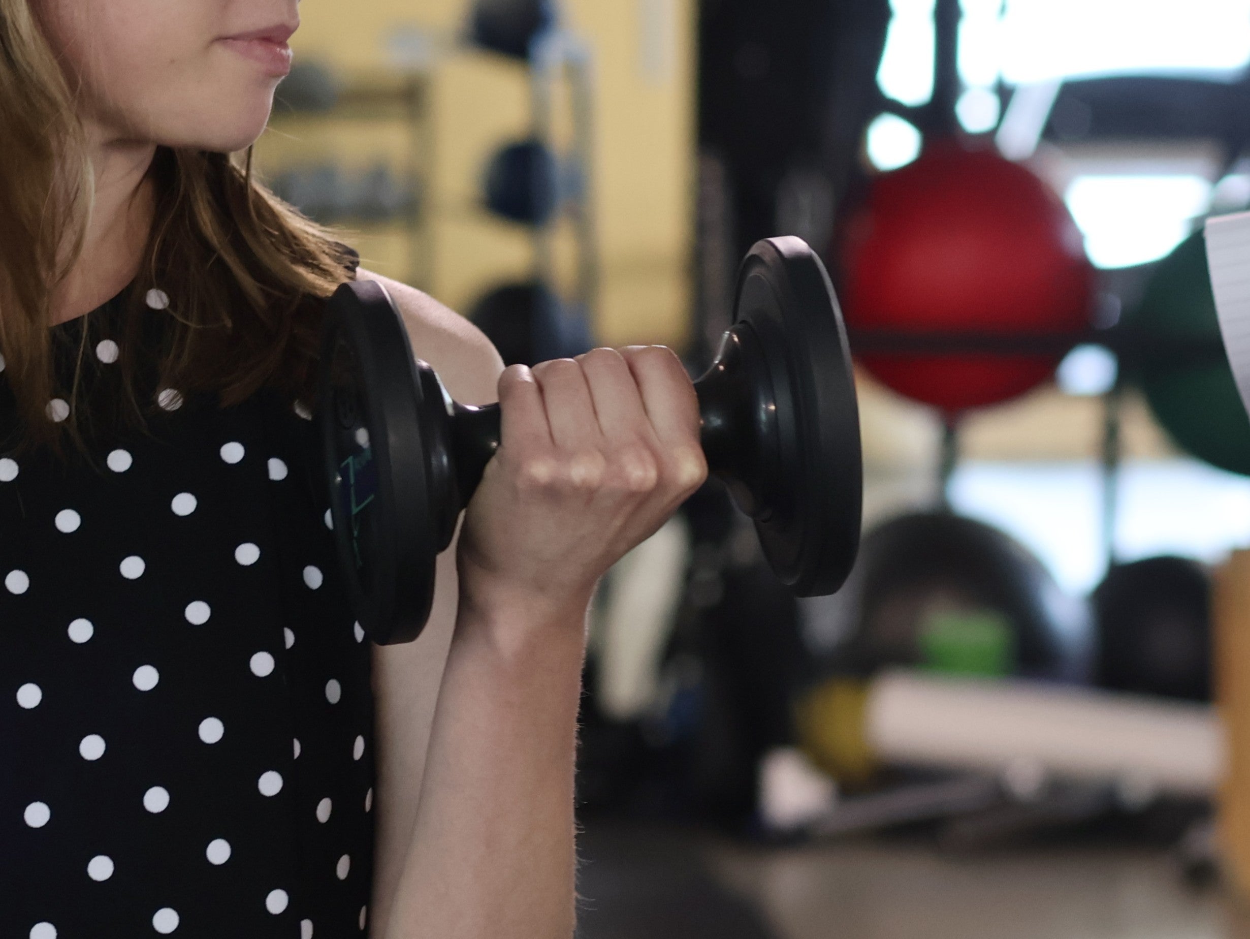 person performing bicep curl