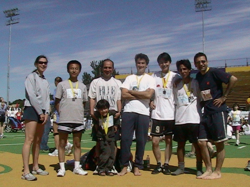 June 2004: 2nd place in the corporate team competition of the Waterloo Classic 10 K race. From left to right: Katja, Ping, Shahab (with son), Holger, Jackie, Jalil, Navid.  