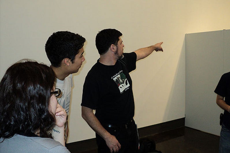 Students looking at something off screen.