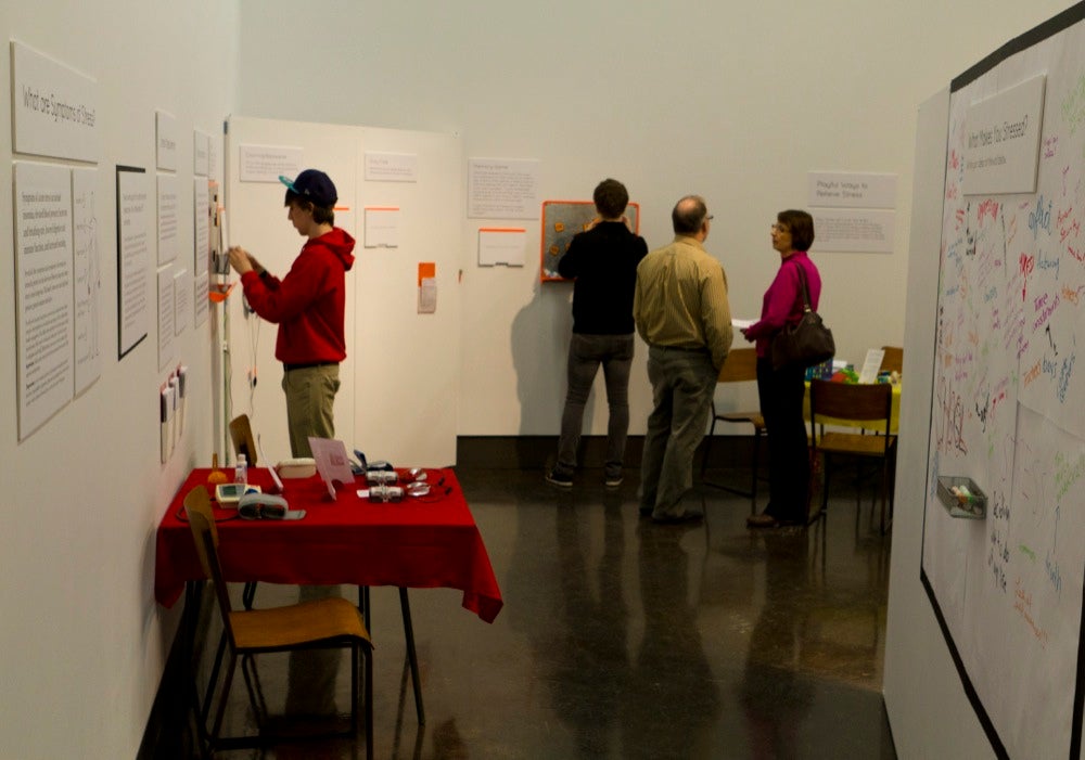 exhibit visitors learning and reflecting