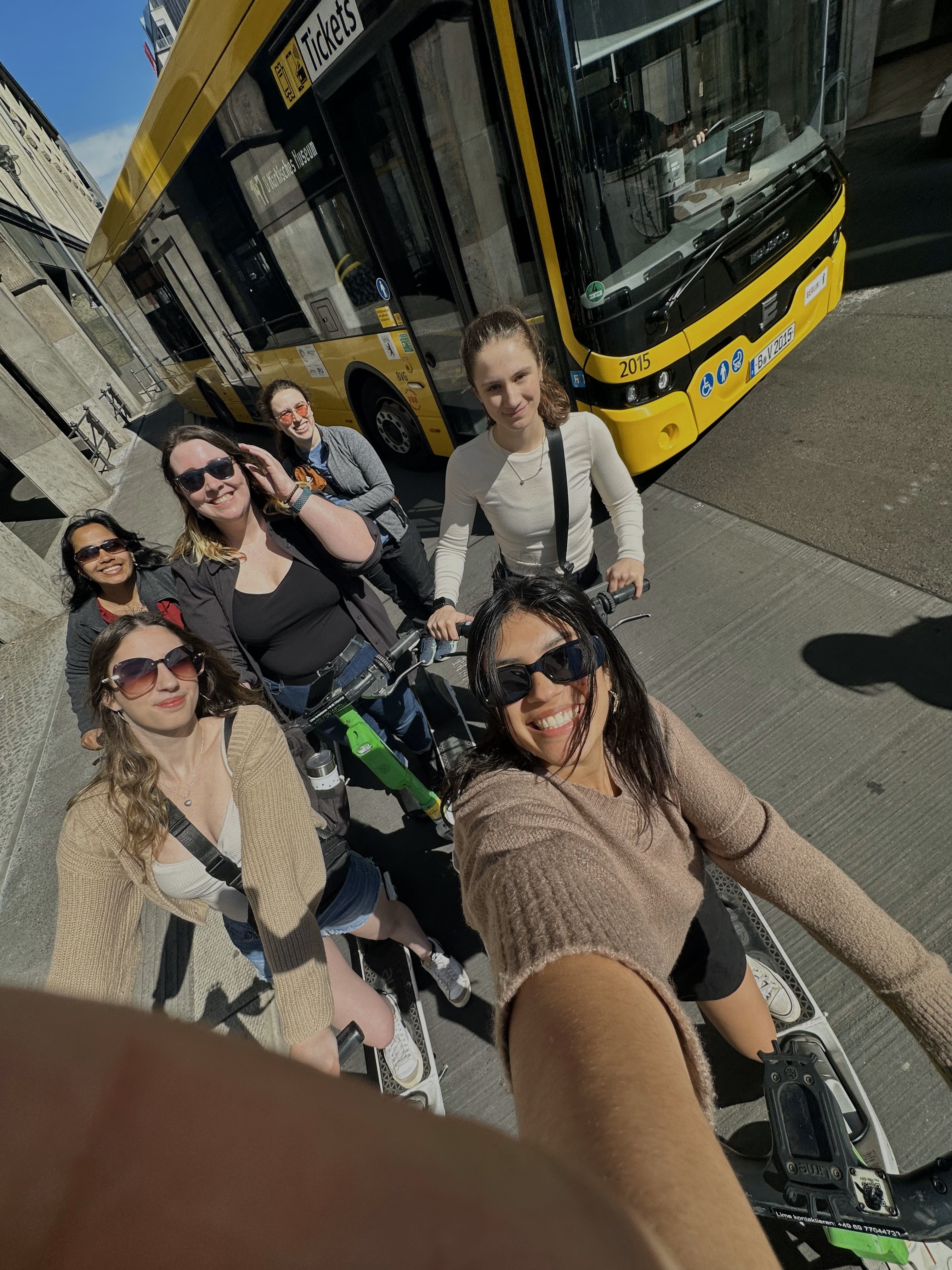 Selfie of six students on bike