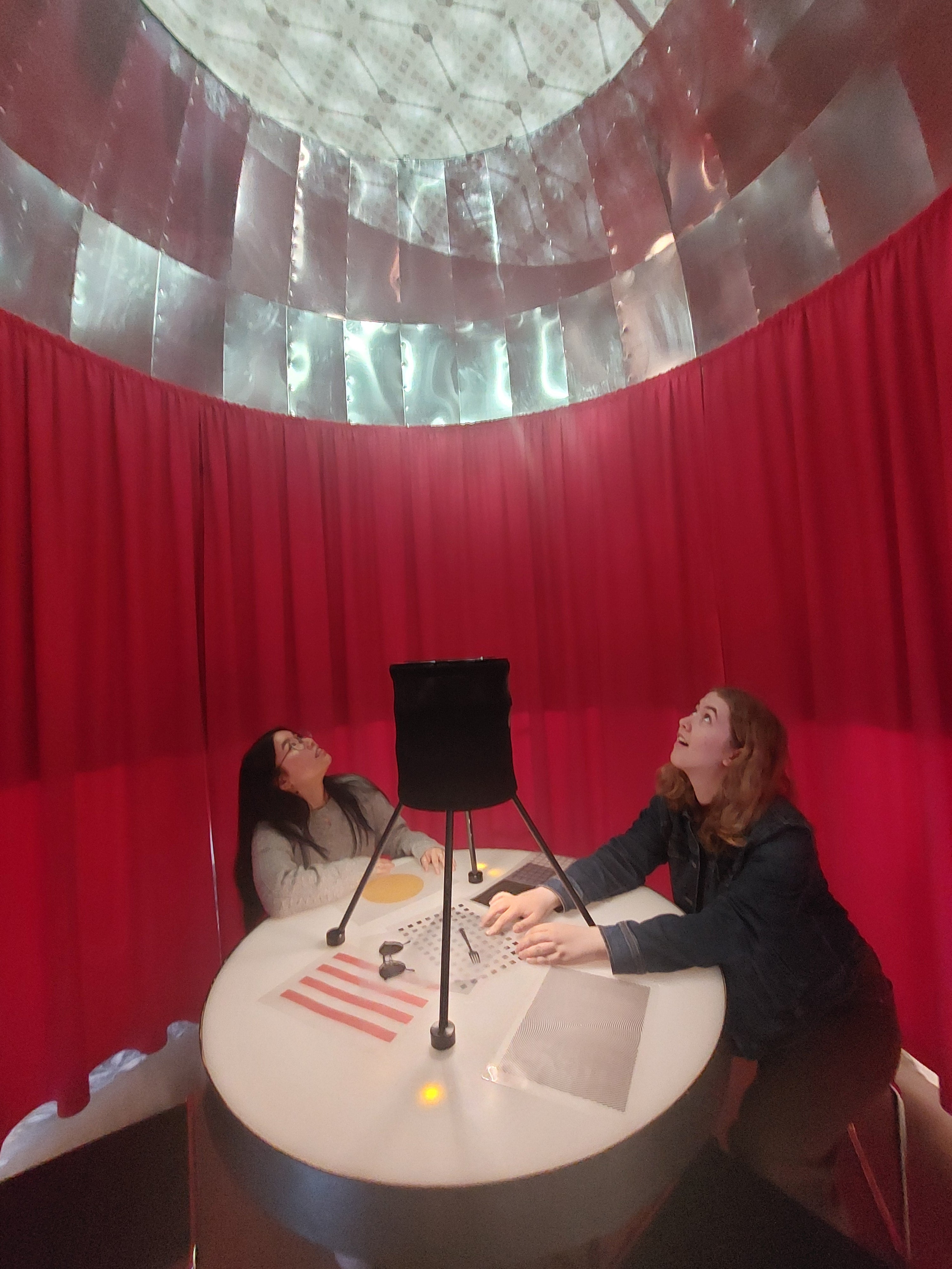 Two students working with a projector