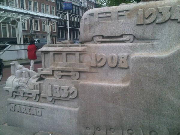 A brief history of railroading, at Sarphatistraat. Metro station in the background.