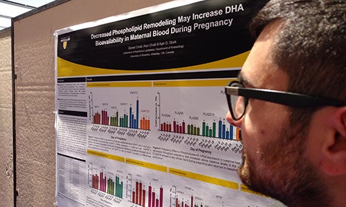 Dan Chalil with his research poster