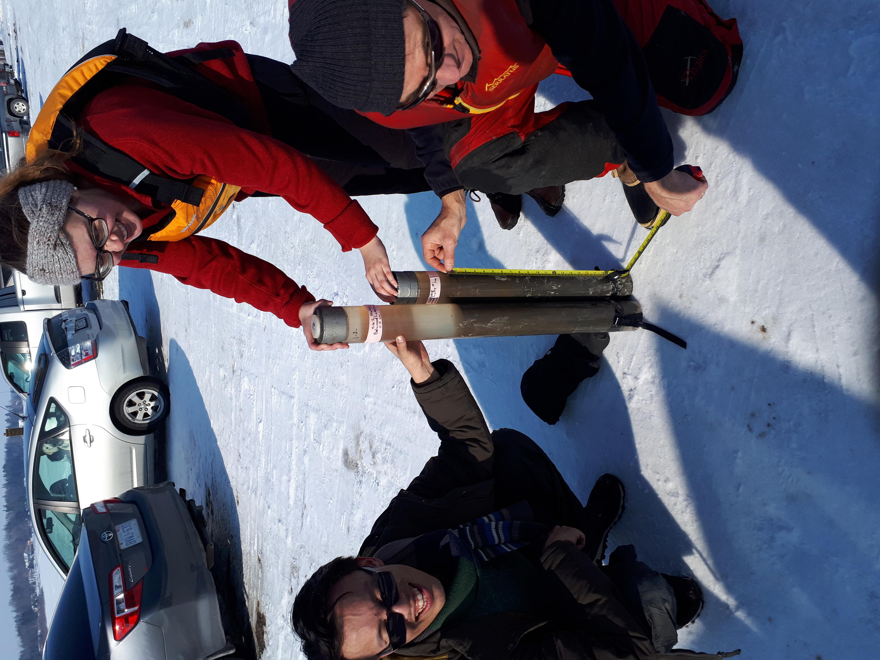 The team shows off the sediment cores