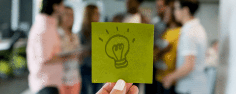 PostIt note with a drawing of a light bulb