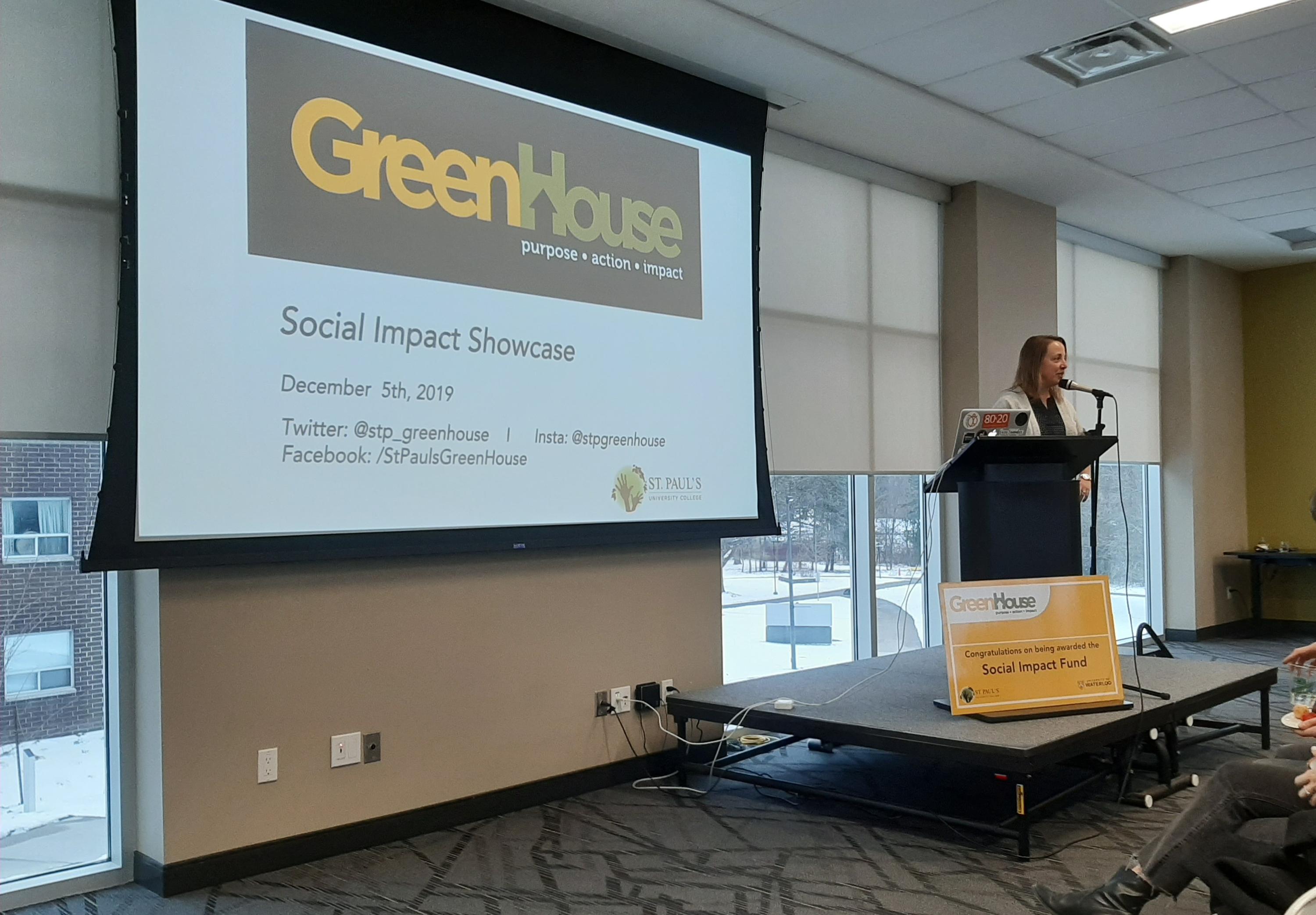 GreenHouse Director Tania Del Matto provides opening remarks at the Social Impact Showcase on December 5, 2019.