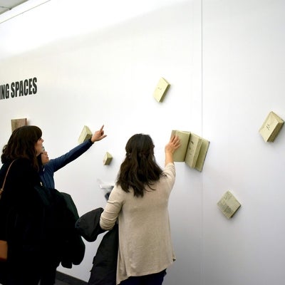 People looking at art