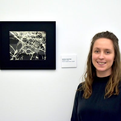 Artist with ink drawing