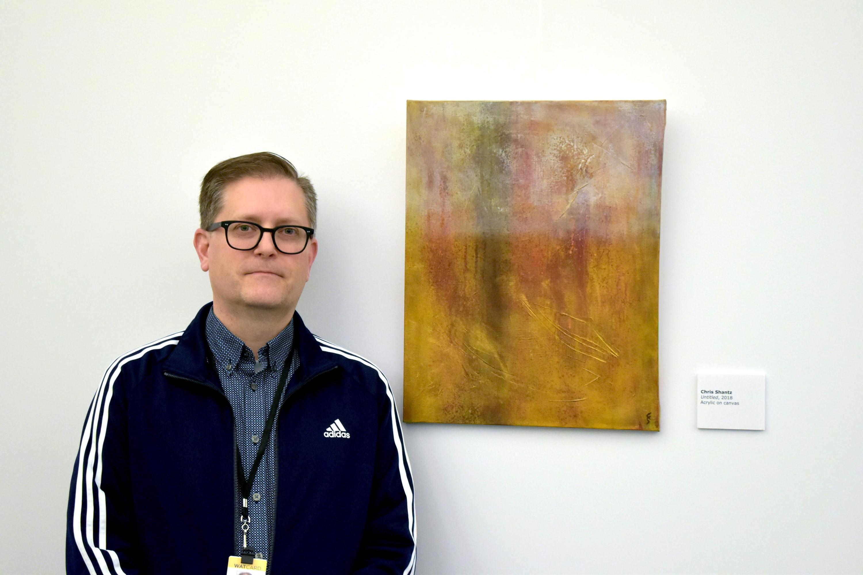 Artist with painting