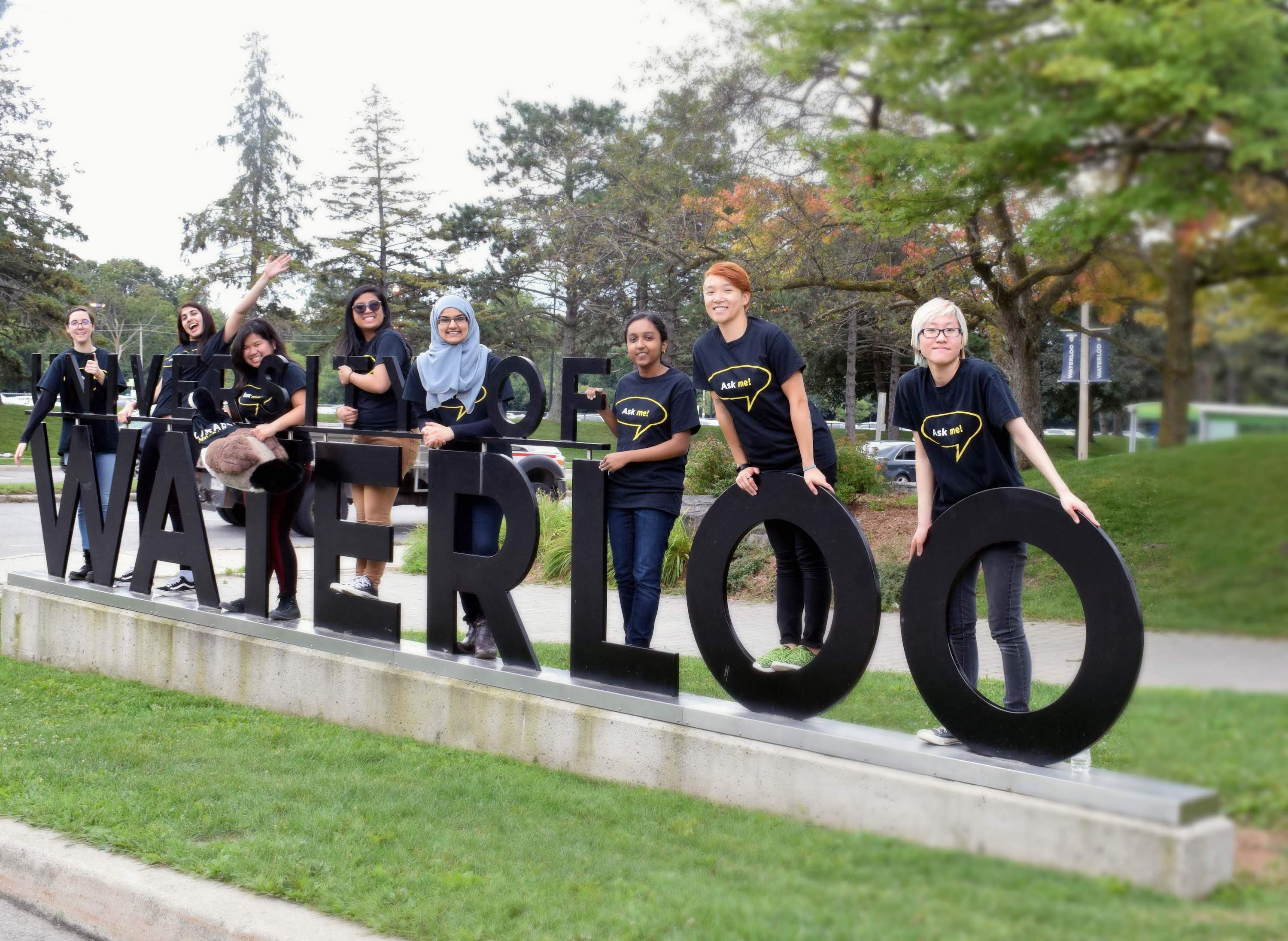 posing at the Waterloo sign
