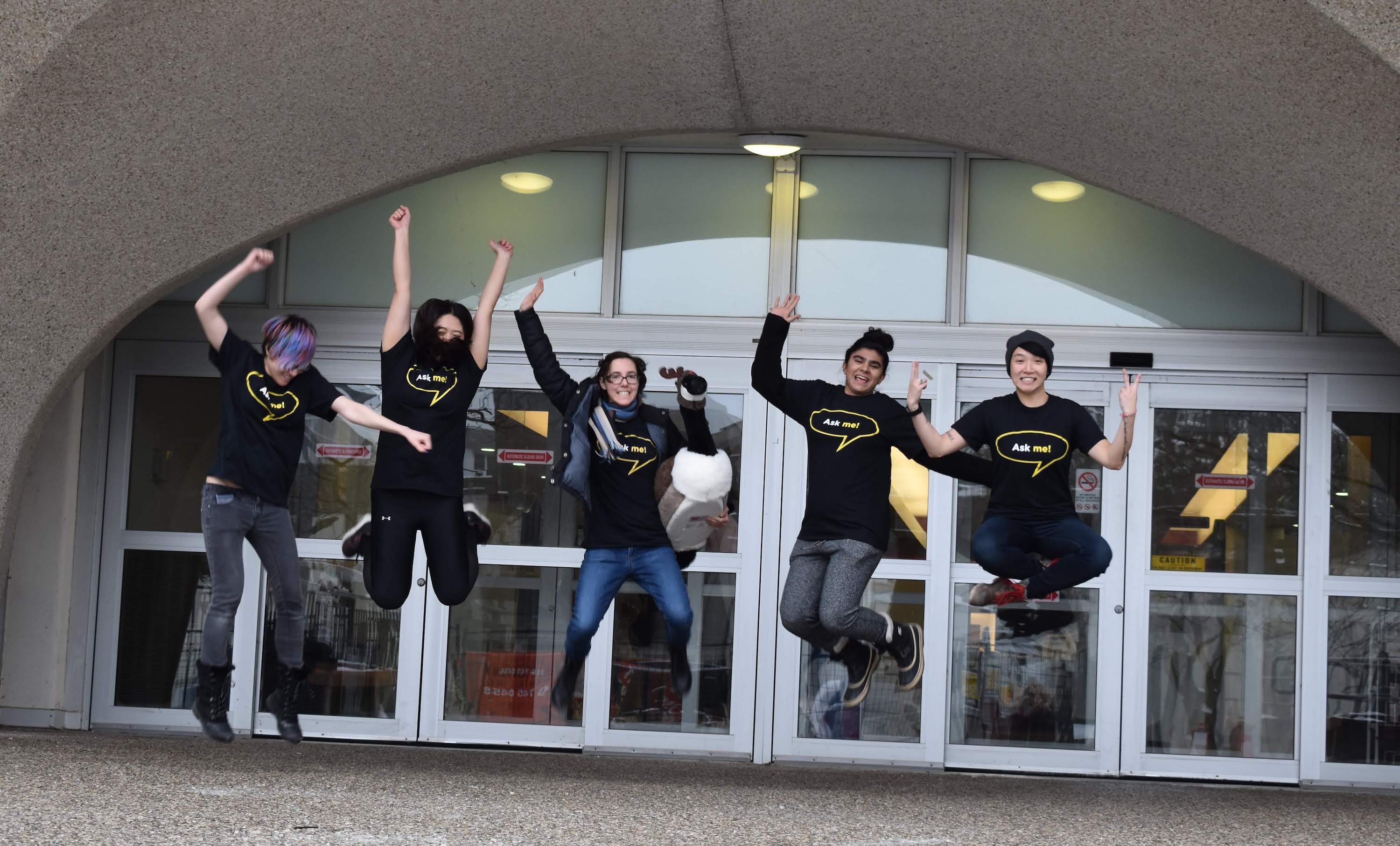 jumping in front of the library