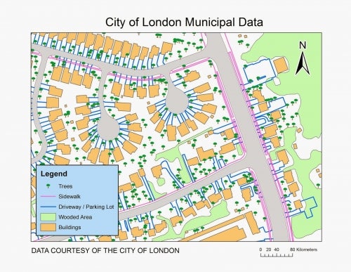 2013 map of London shows neighbourhood with trees, sidewalks, driveways/ parking lots, wooded area and buildings