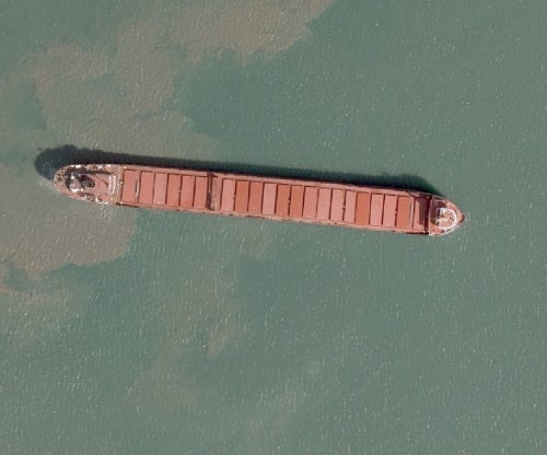 image shows container ship 