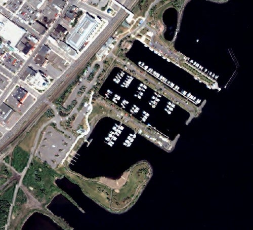 quickbird imagery shows boat docks and boats along the ThunderBay shoreline