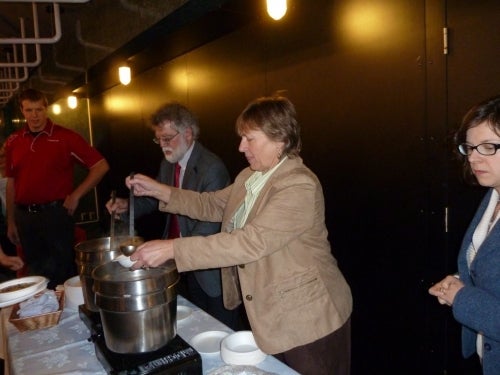 mark and sharon serving soup