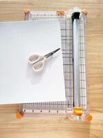papercutter, paper and scissors