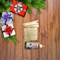 popsicle sticks and glue wooden table with presents