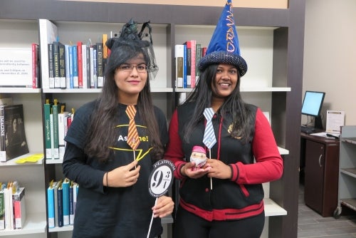 Two women dressed up like witches