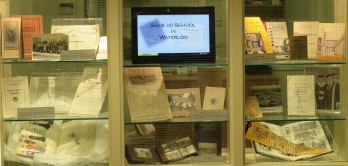 display case featuring school-related items