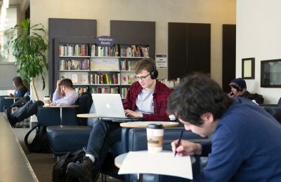 students in Dana Porter Library lounge
