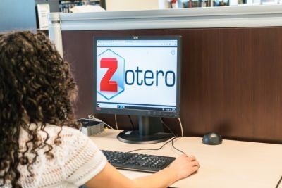 student viewing Zotero on computer