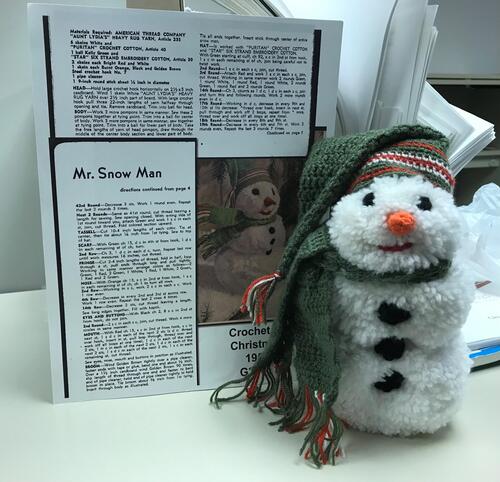 Example of Mr. Snow Man with partial view of pattern used to make it