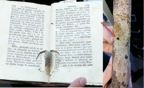 page damage and spine with small hole