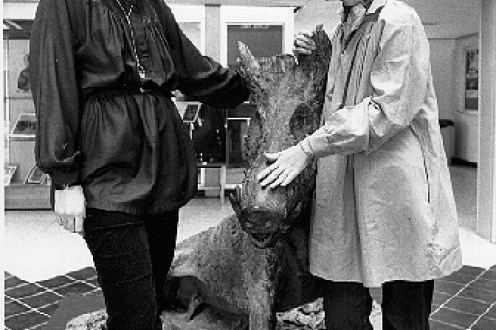 Student and teacher with boar.