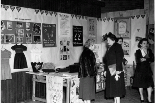Women in front of displays.