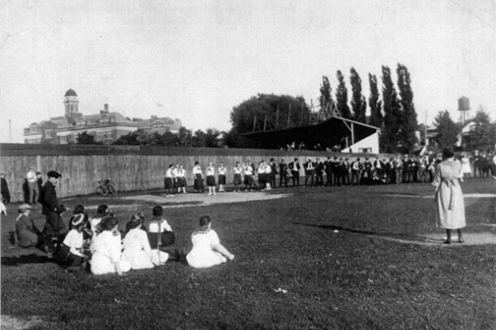Baseball teams in park.