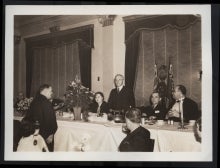 William John Motz standing at banquet table.