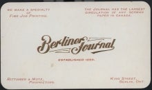 White Berliner Journal business card with logo.