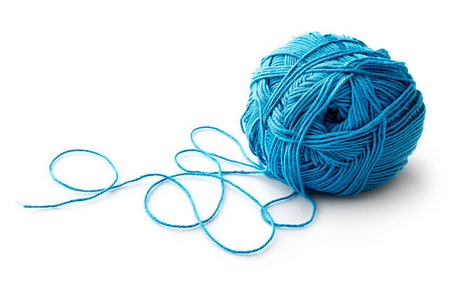 blue ball of yarn unravelling