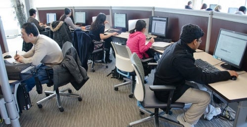 Students using the public workstations at the Dana Porter Library