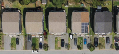 Solar panels on the roof of houses in a neighbourhood