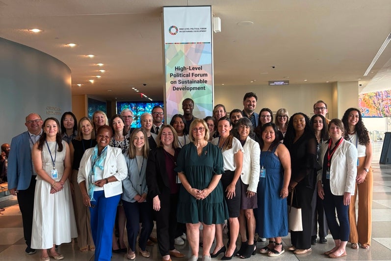 Canadian delegates standing for a photo