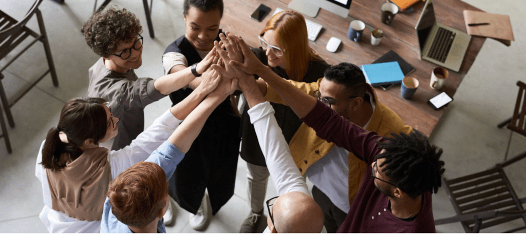 group of people with hands together