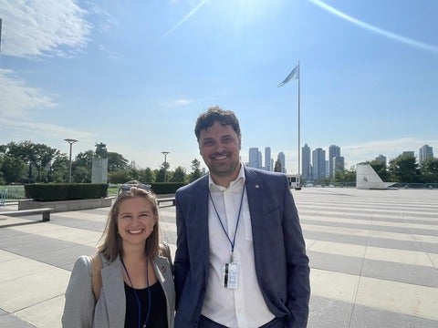Jon and Laura with blue sky behind them
