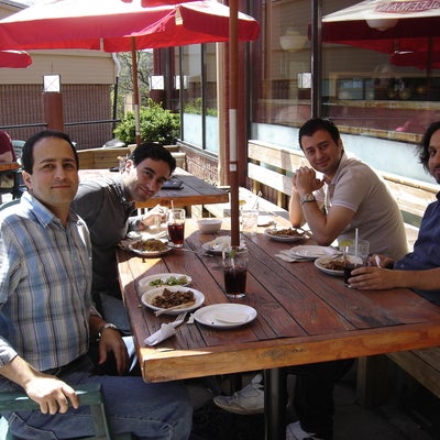 Students and Prof. Behrad having lunch outside in 2009