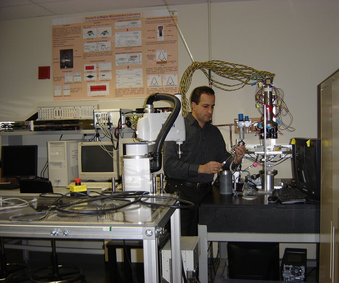 Behrad working in his lab
