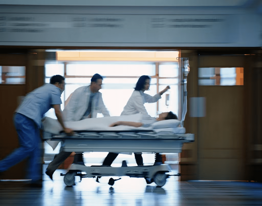 Medical staff transporting patient quickly