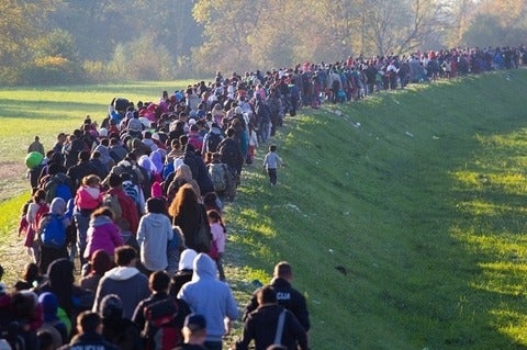 A crowd of people migrating