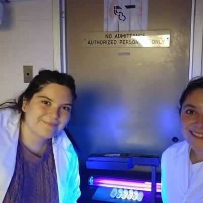 Students in the lab show off their Quantum Dots
