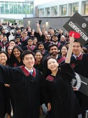 group of people wearing graduation gowns