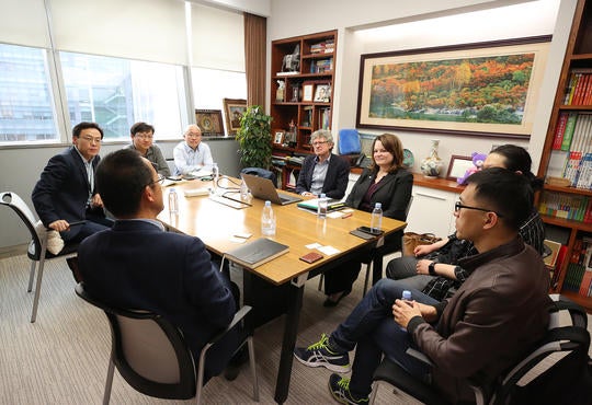 Dean Stephen Watt visiting with alumni in Beijing, China
