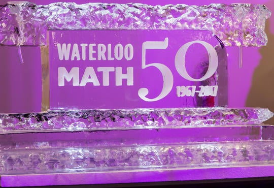 Ice sculpture with Waterloo Math 50 years etched in