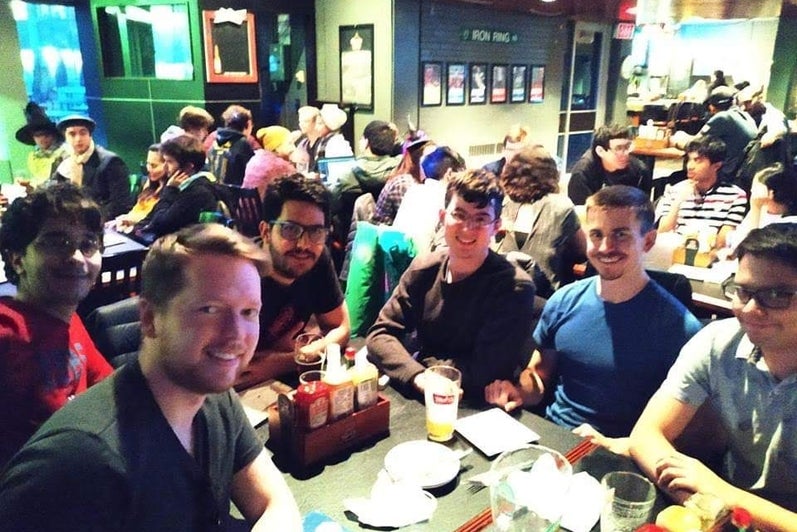 A group of students sitting in a pub