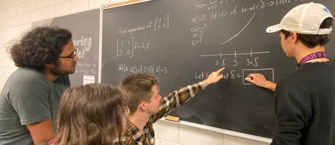 students doing math in tutoring centre